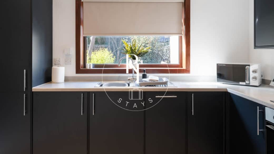 Fully Equipped Kitchen - with Microwave, oven, dishwasher, washing machine, fridge freezer, and oven