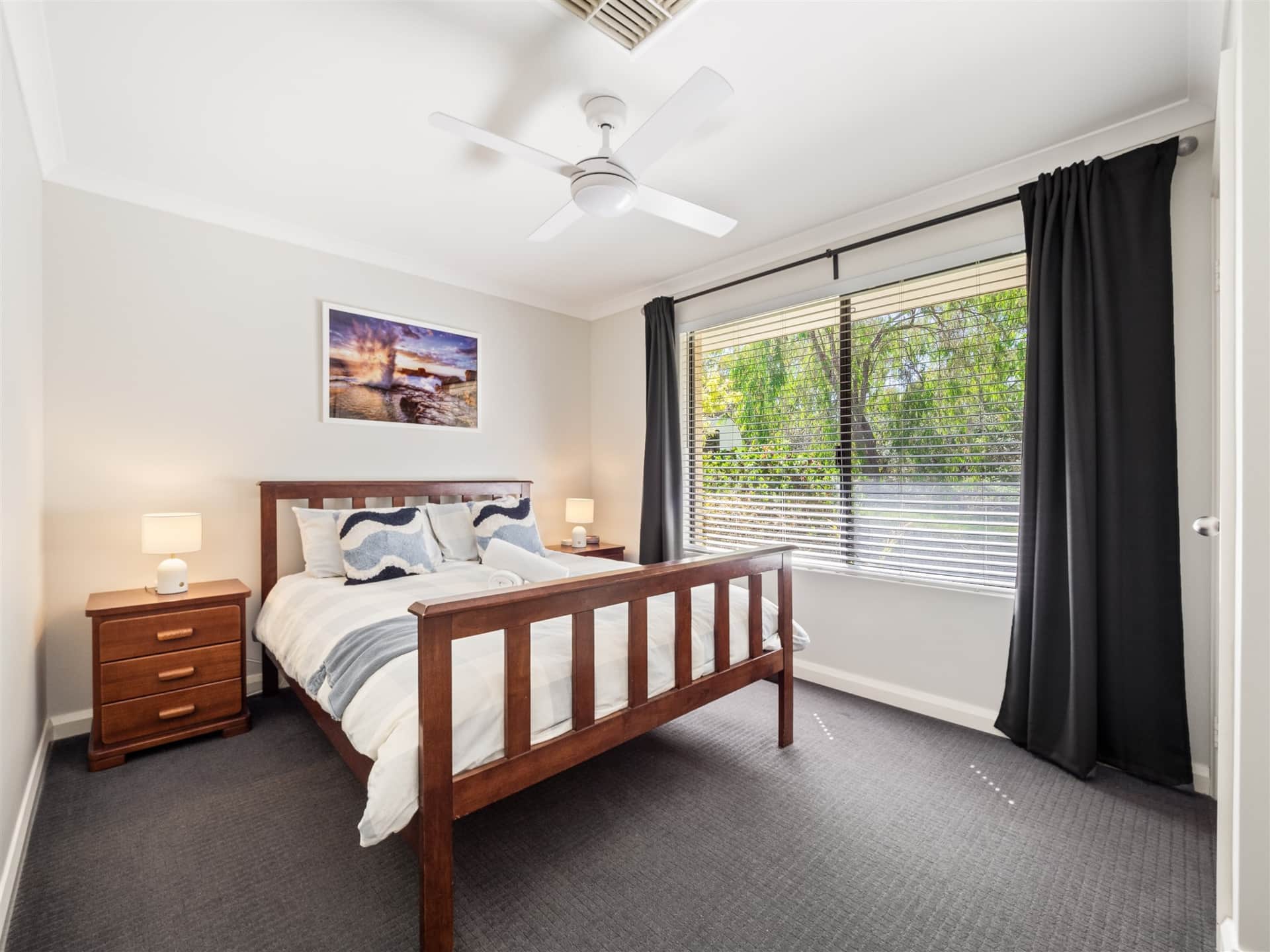 Coastal theme queen size suite overlooking natural bushland