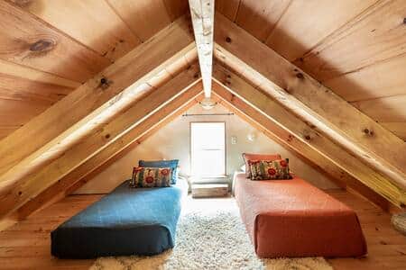 Climb a steep set of stairs to reach this cozy loft.