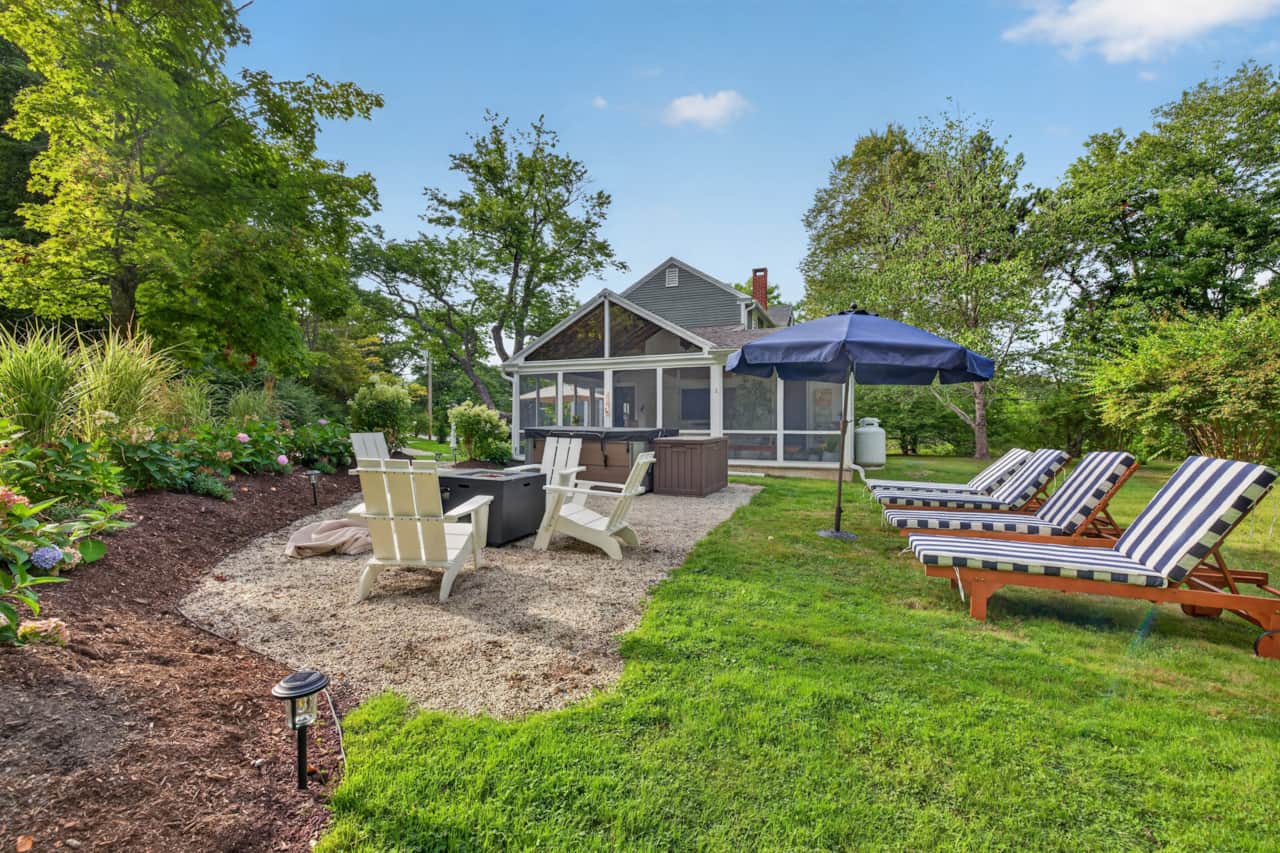 Lounge outside by the fire pit, or take a plunge in the hot tub.