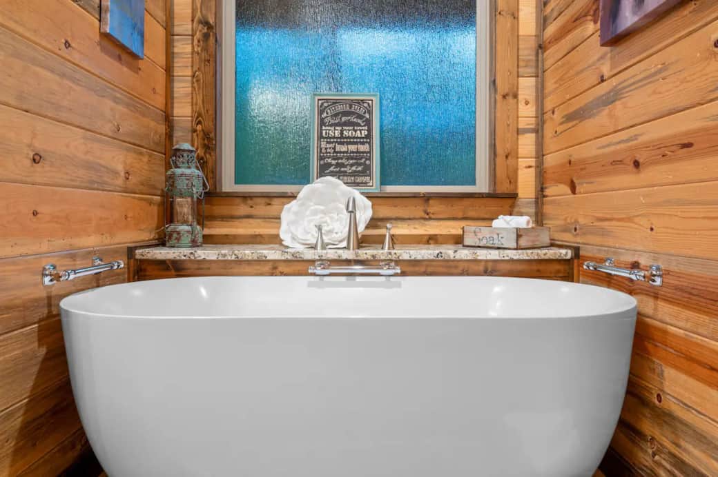 Freestanding soaker tub is ready for your Me Time in the first floor king suite. Luxury awaits!