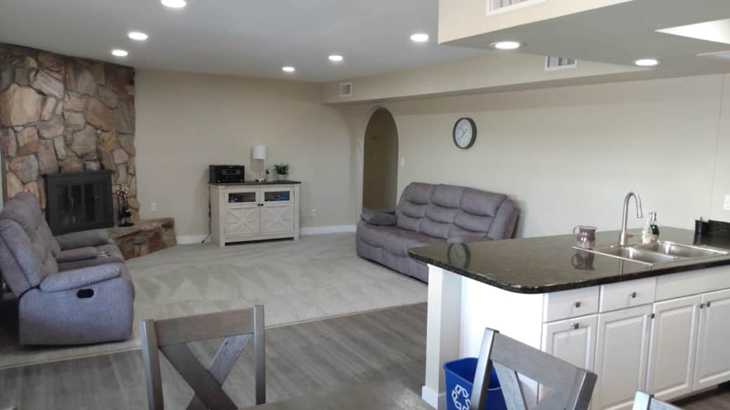 Open floor plan connects eat-in kitchen to cozy family room Open floor plan connects eat-in kitchen to cozy family room