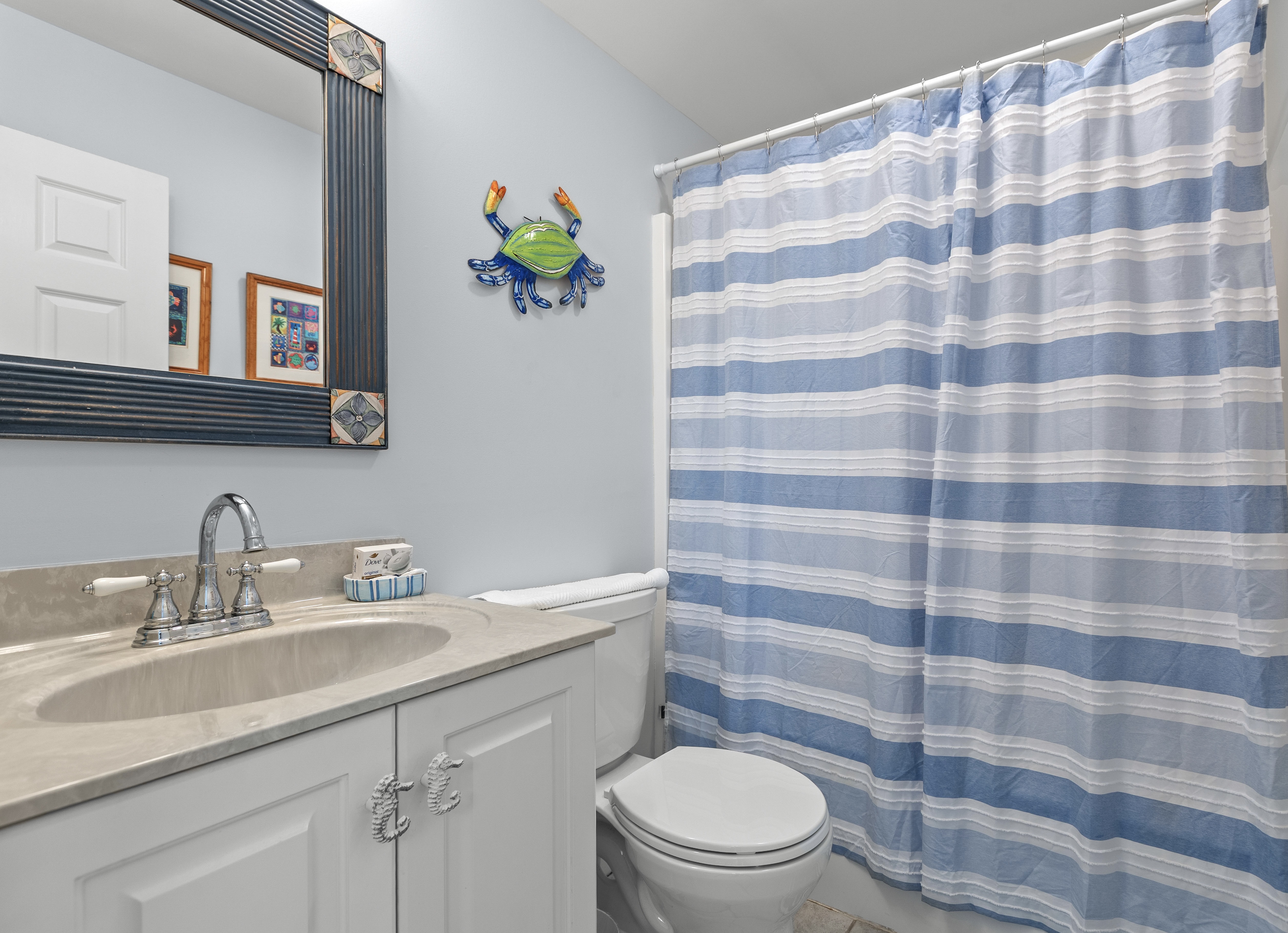 Full bathroom with a tub-shower combo
