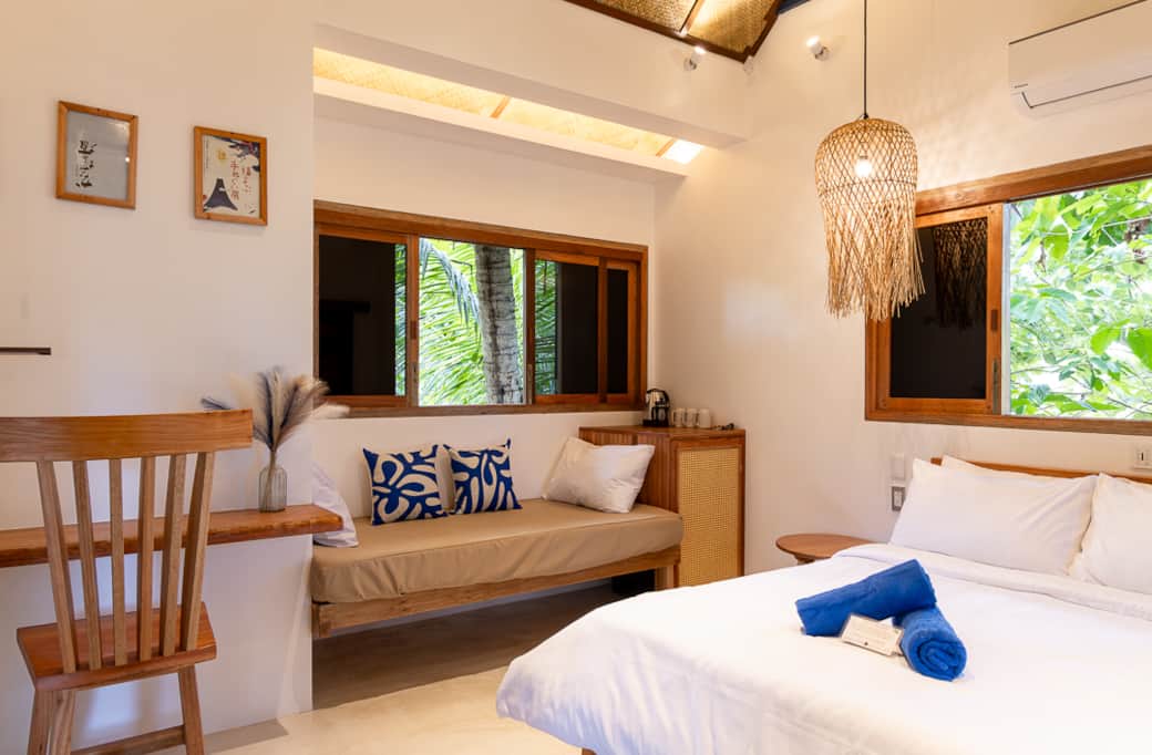 A comfy desk, a cozy queen bed, and a single bed for extra comfort or for additional family member.