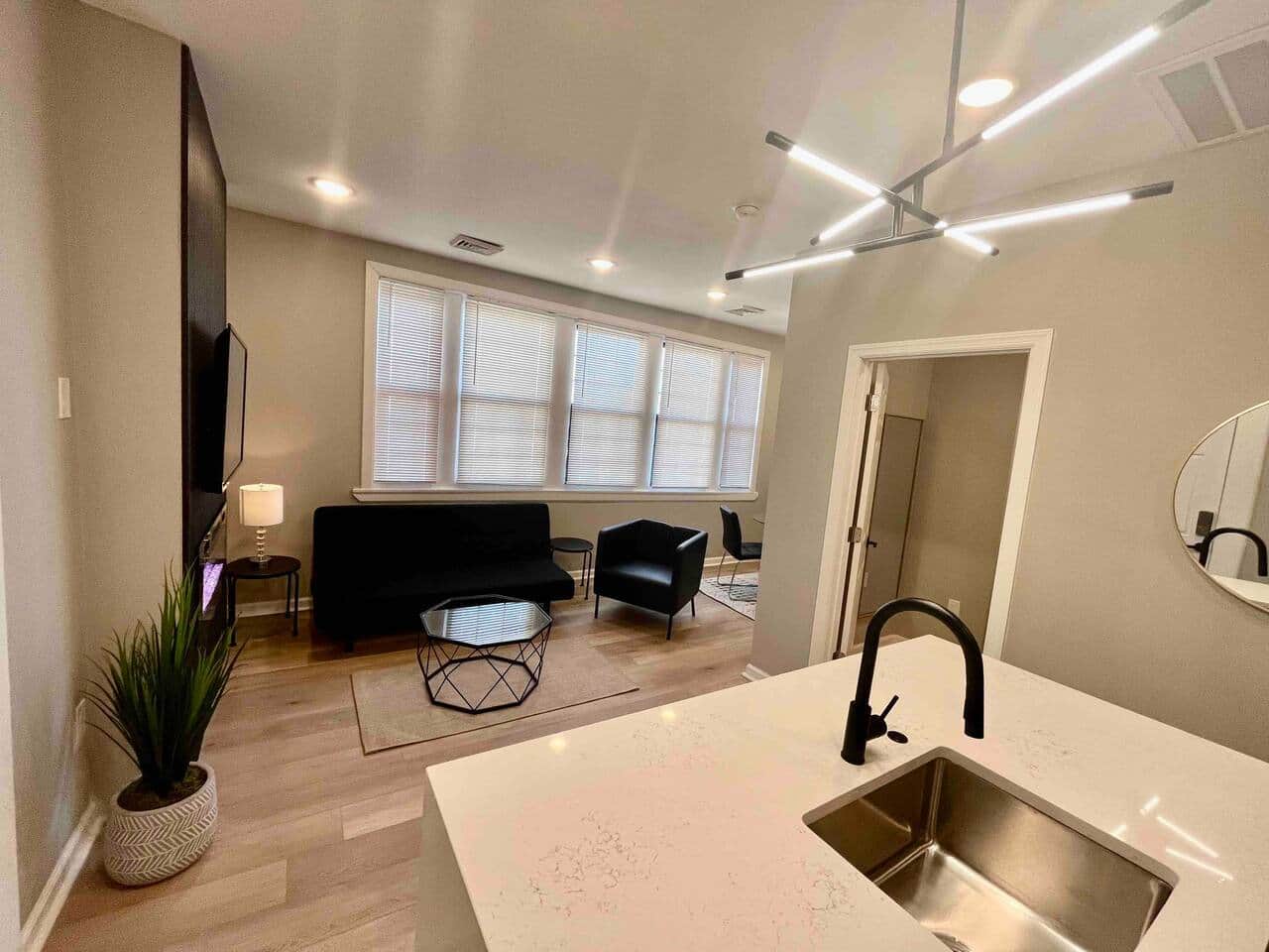 Brand new kitchen and appliances with breakfast bar, dishwasher ,microwave, refrigerator. 
Joined with the living room with futon sofa bed, large flat screen tv , fireplace and dining room. 