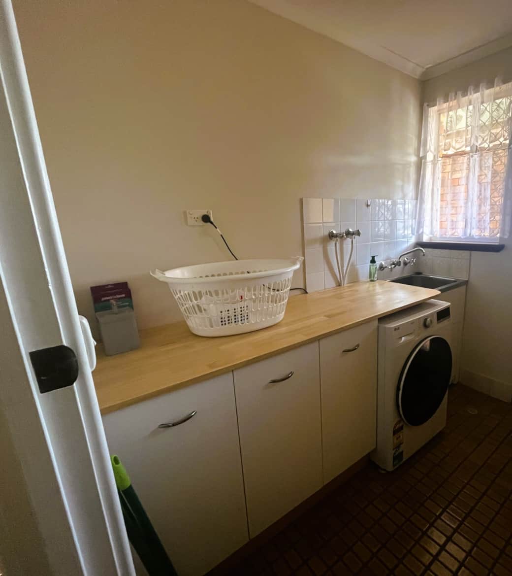 Dedicated laundry at Smugglers Cove accommodation in Esperance with washing machine and dryer