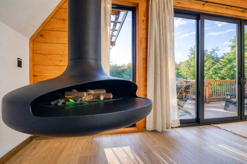 Relax by the luxury hanging fireplace or enjoy cozy movie nights.