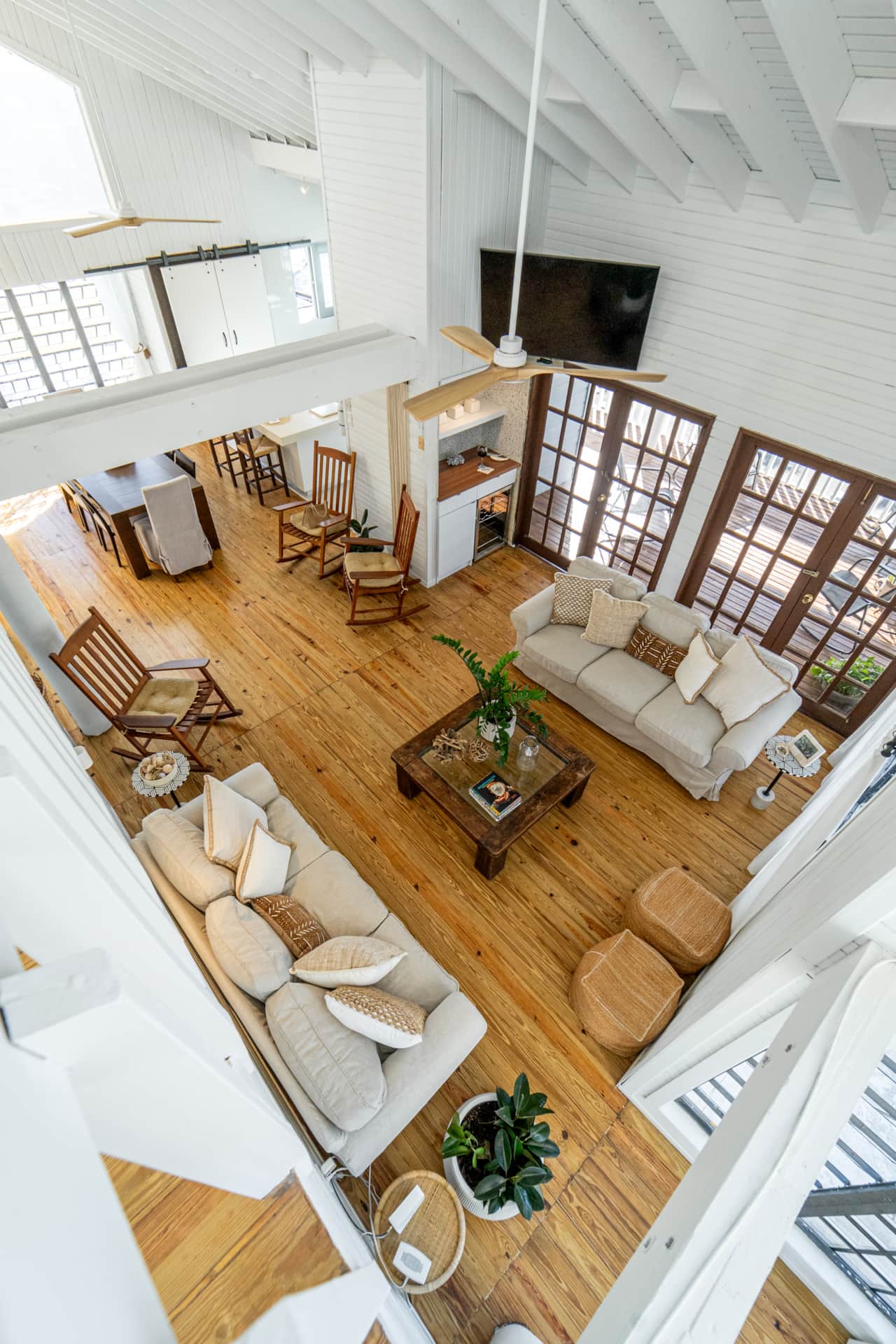 Spacious Caribbean beach chalet–style living area designed for gathering with family and friends.