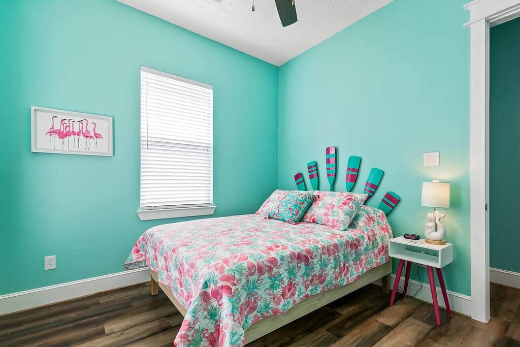 Bedroom 2 with Queen Bed and rear Balcony access