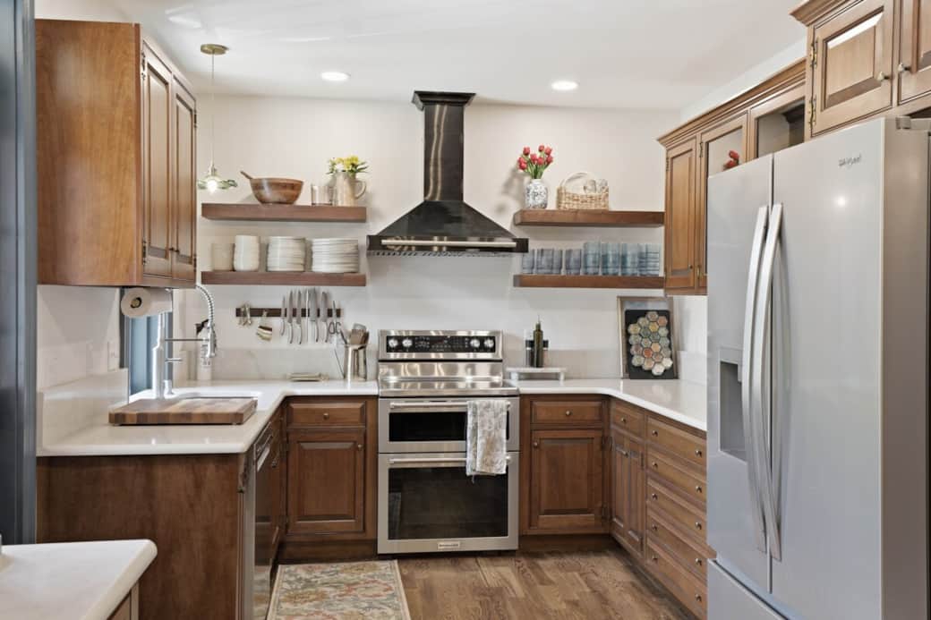 Fully stocked kitchen with double oven, dishwasher, oversized fridge, and wine/beverage fridge. Additional professional photos coming soon.