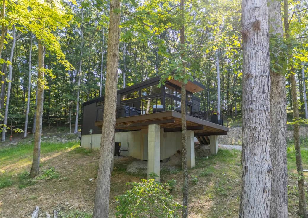 Soak in The Hemwood's hot tub surrounded by three acres of woods or relax on modern outdoor furniture with scenic views. Enjoy your private Brown County retreat.