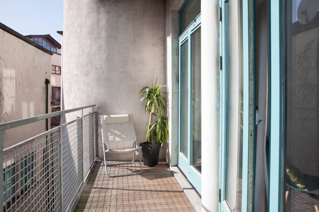 Balcony at rear of the apartment - accessible from both bedrooms - gets the morning sun.
