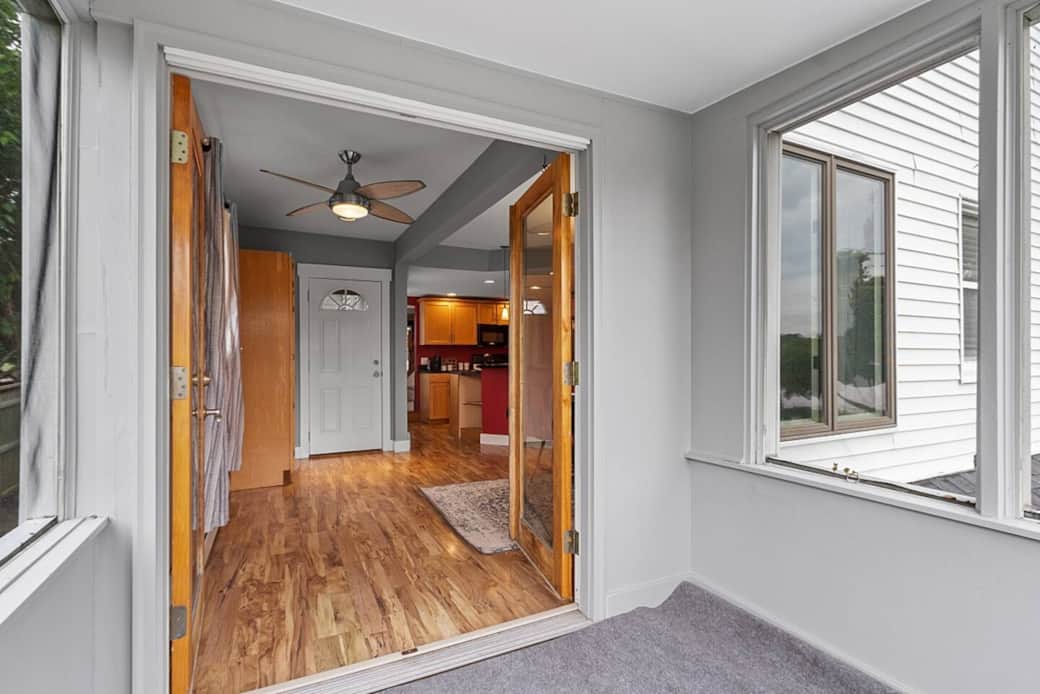 French doors from screen porch into dining room.