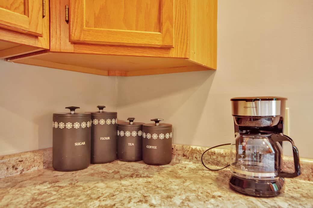 Coffee maker, basket filter, bring your own coffee supplies. 