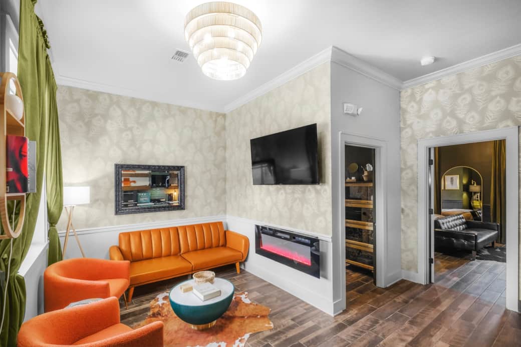 Spacious separate living room with one of the two full size sofa sleepers