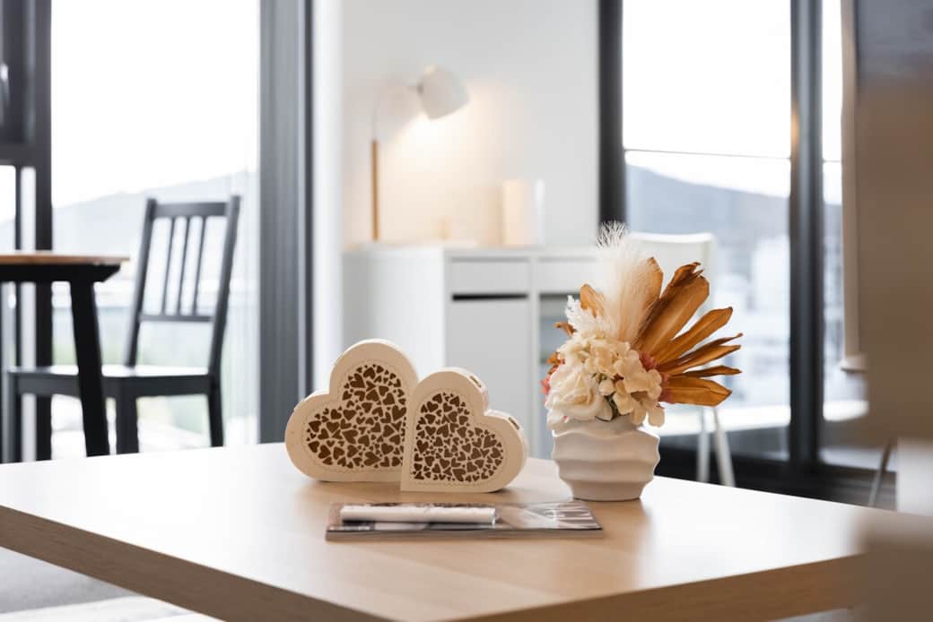 Enjoy your personal time in our workspace ,  with lovely decorations on the table. Natural light and decorative table elements create an inviting space for guests to gather together and share stories.