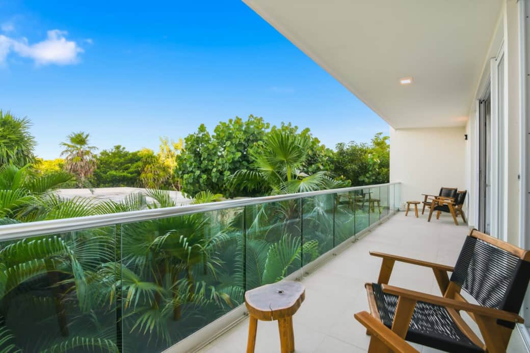 Enjoy a private balcony off the bedroom and living room, complete with outdoor seating and views of lush greenery, the pool, and Akumal’s beautiful skies—perfect for mornings or sunset. Enjoy a private balcony off the bedroom and living room, complete with outdoor seating and views of lush greenery, the pool, and Akumal’s beautiful skies—perfect for mornings or sunset.