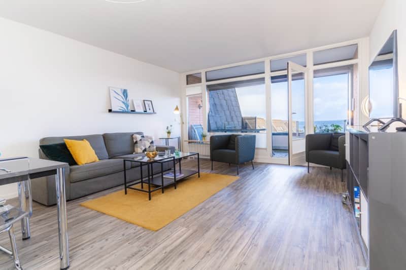 Wohnzimmer mit Blick auf den Strand