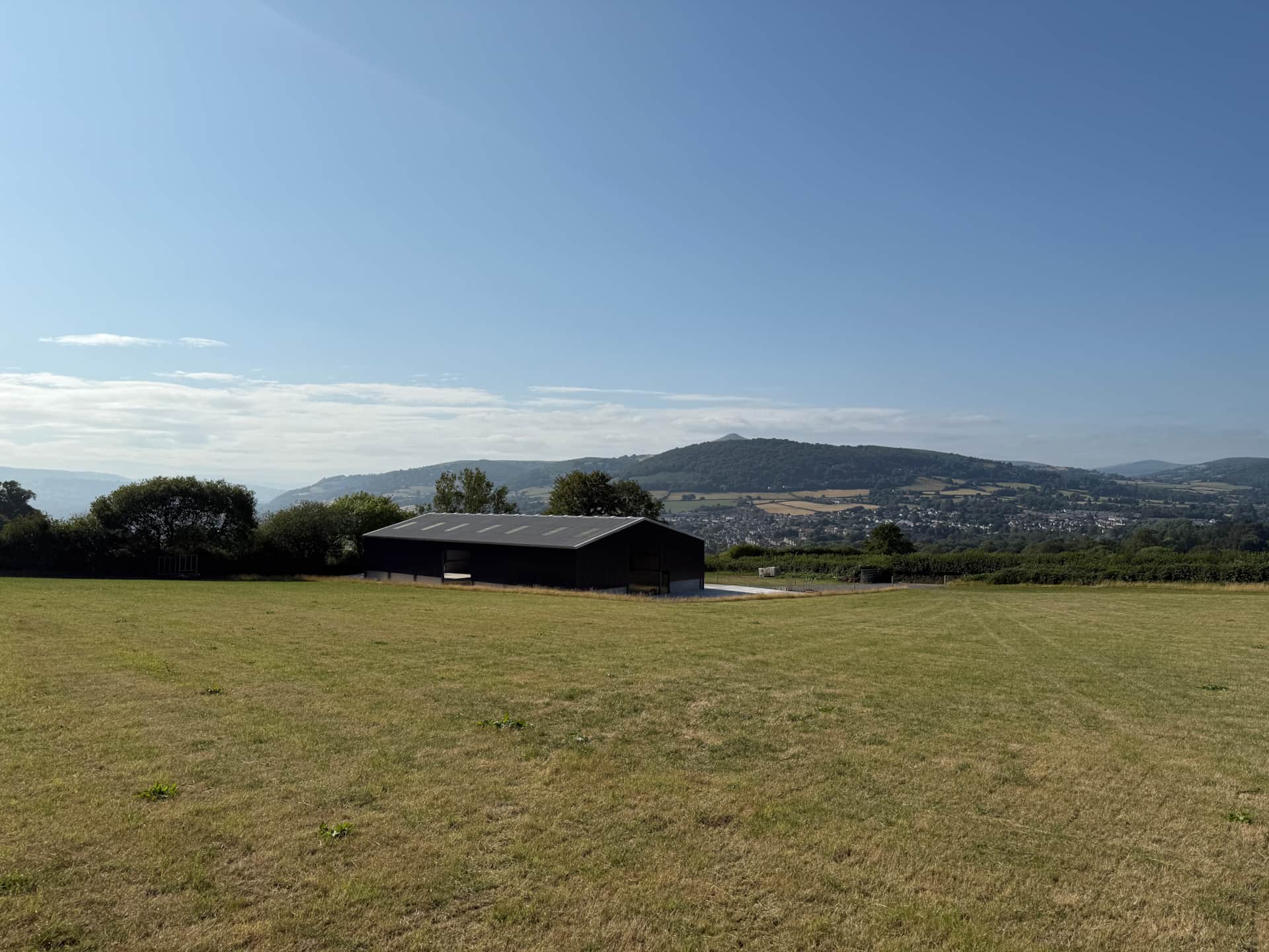 Evening lights and countryside backdrop