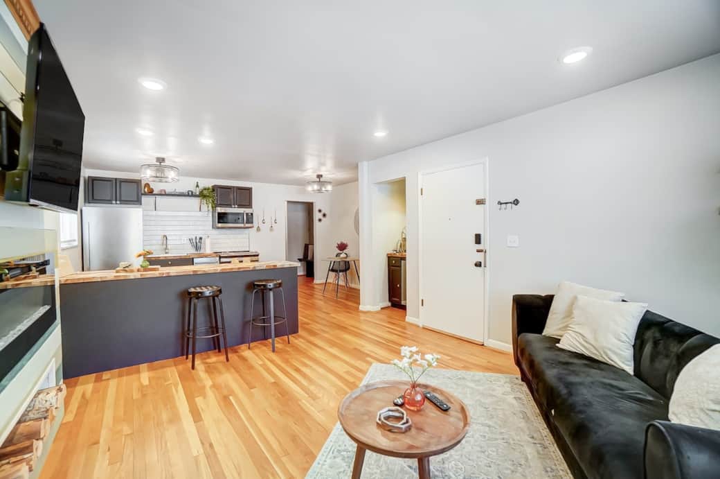 Open Concept Kitchen, Living Room with Indoor Fireplace and Built in Wet Bar 