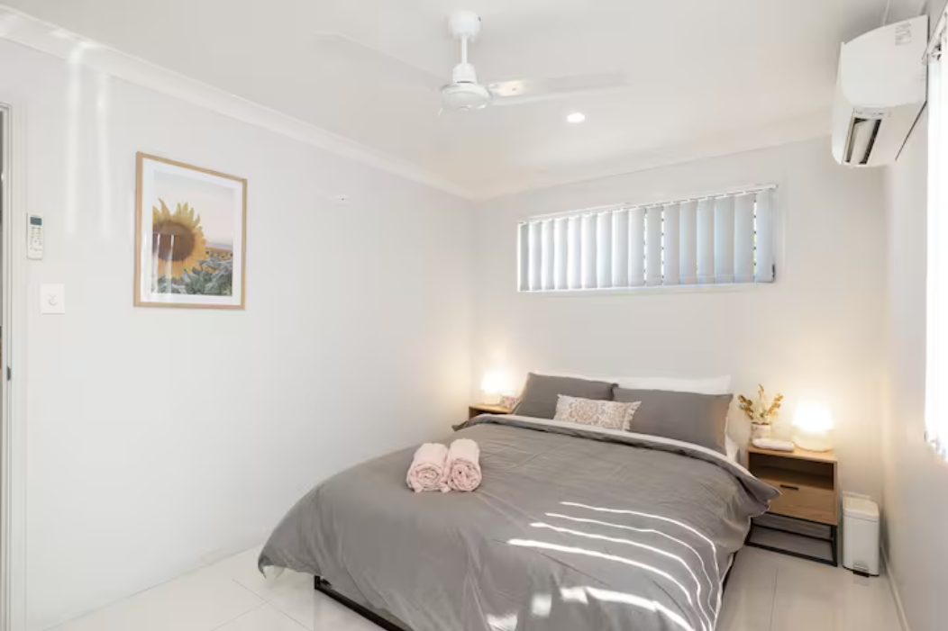 Bedroom: Peaceful bedroom with cozy design and ample storage 