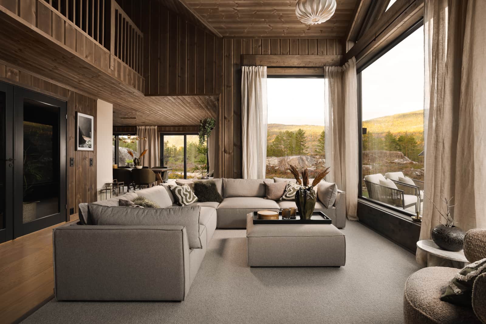 Sfeervolle woonkamer van Villa Lakehouse Moss