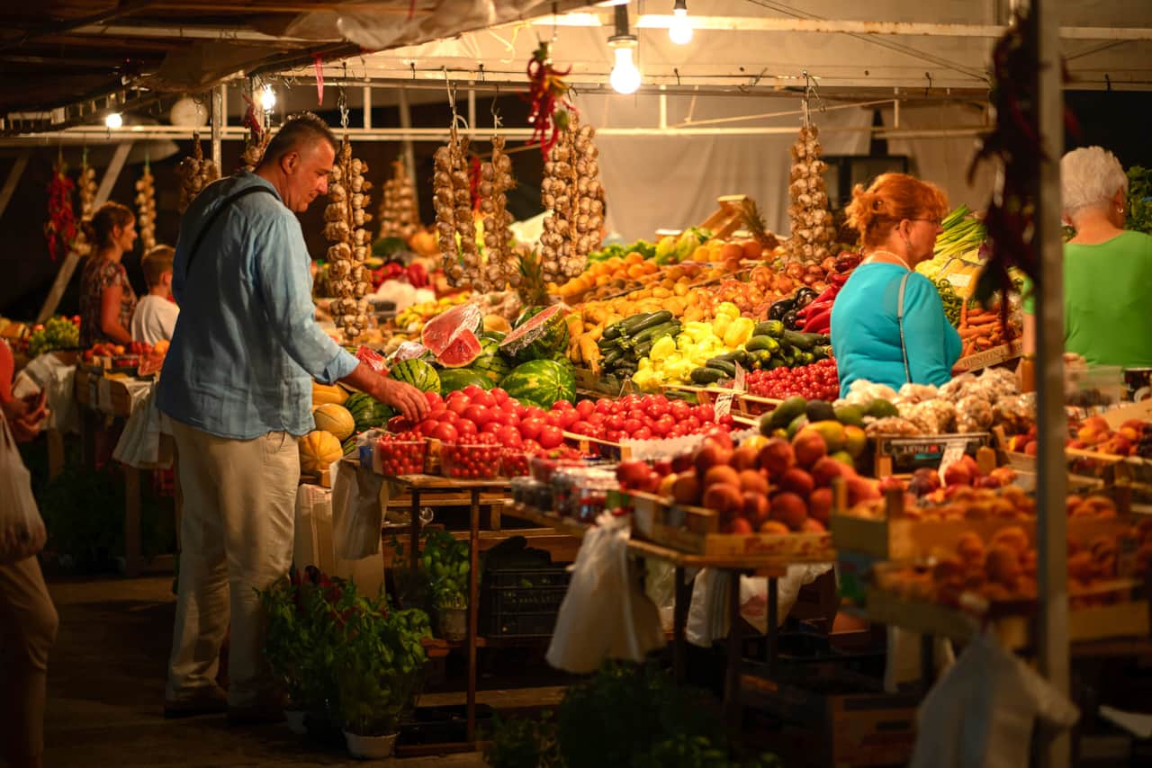 Buy fruit and vegetables at the local market
