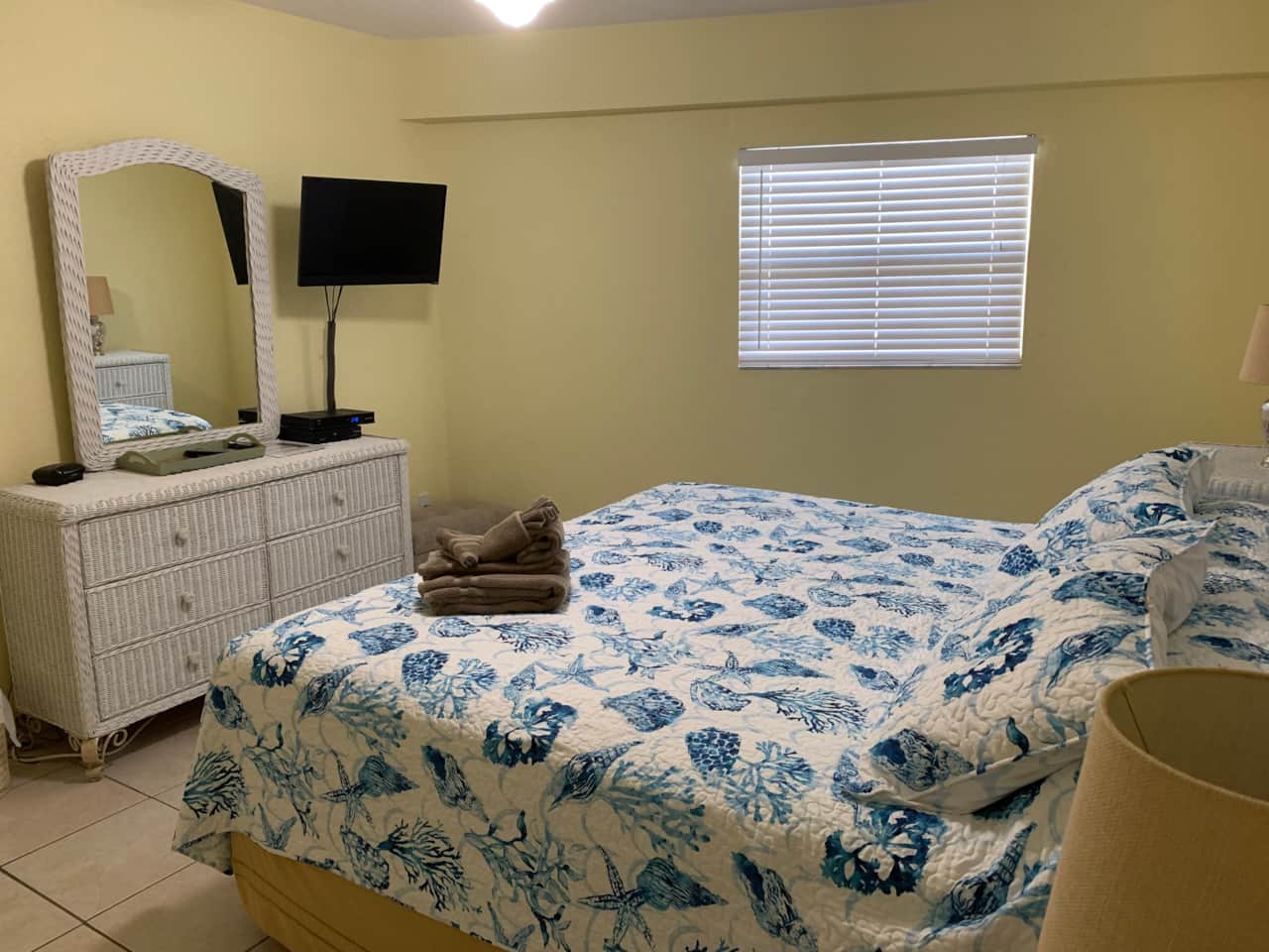 Flat screen TV in bedroom