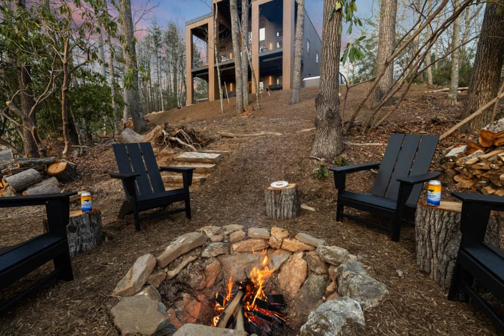 Fireside glow, mountain backdrop—The River Bed warms up as the sun goes down.