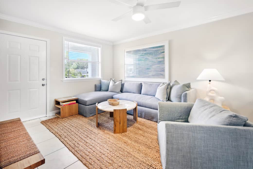 Lounge around in your cozy living room with ceiling fan and Smart tv