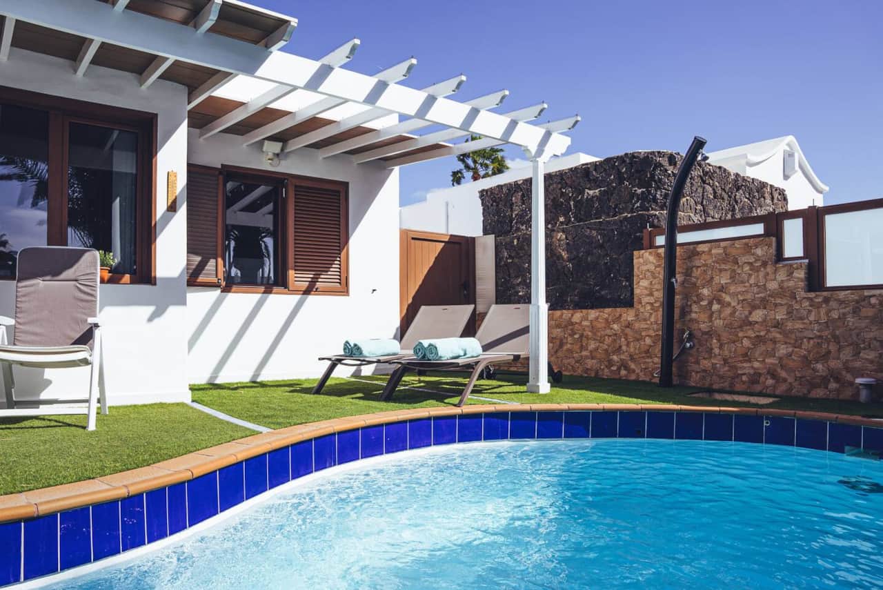 Private heated swimming pool and outdoor terrace at Villa Dyala in Lanzarote
