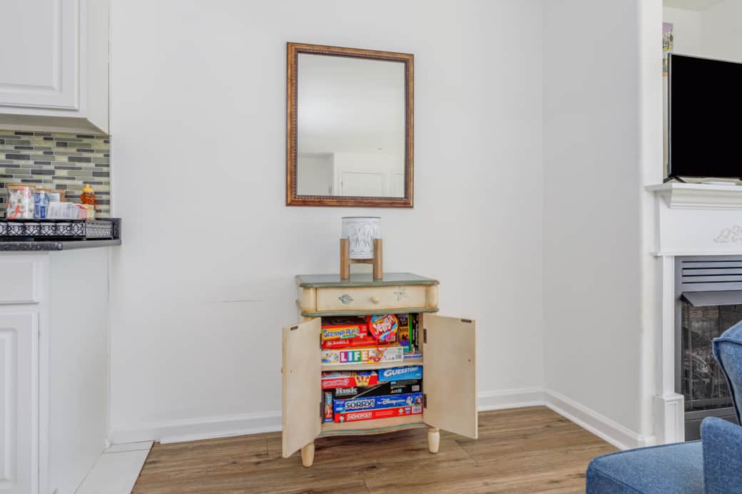 A favorite for rainy days or downtime—this cabinet is stocked with board games for a fun night in