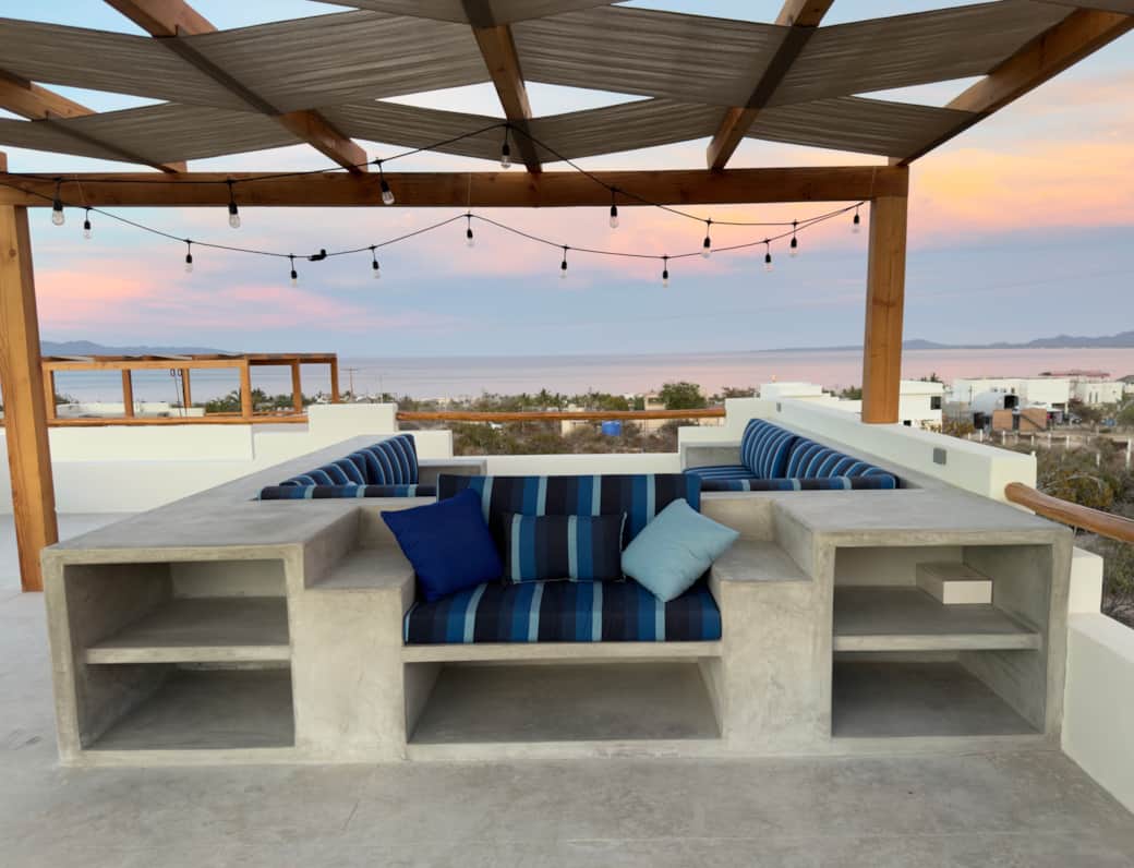 Enjoy stunning sunsets over the mountains from the love seat—or your very own sunset throne