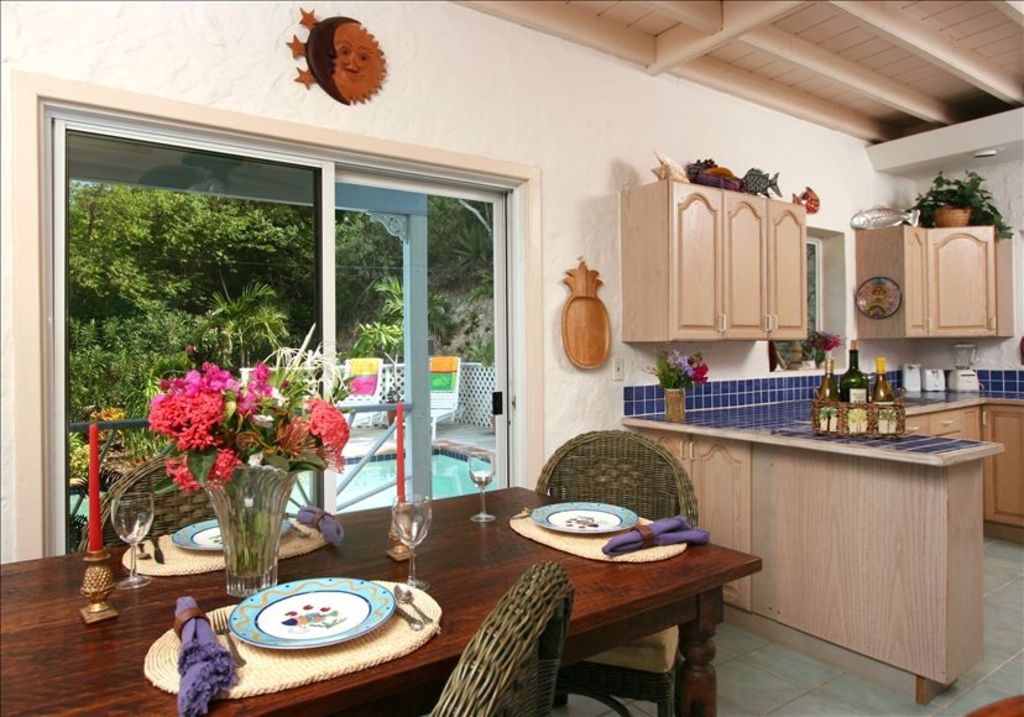 Kitchen and Dining room with pool just a step away