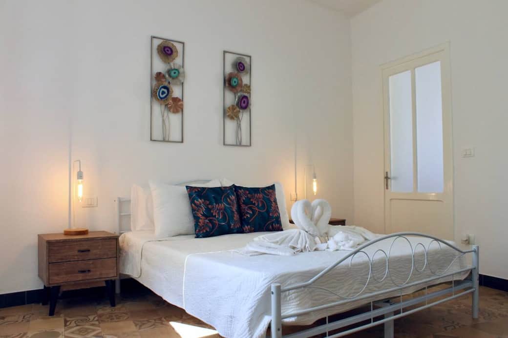 Sleep like a royal family member on the queen-size bed in the bedroom.