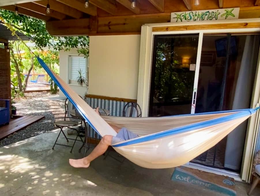 Hammock located outside door.