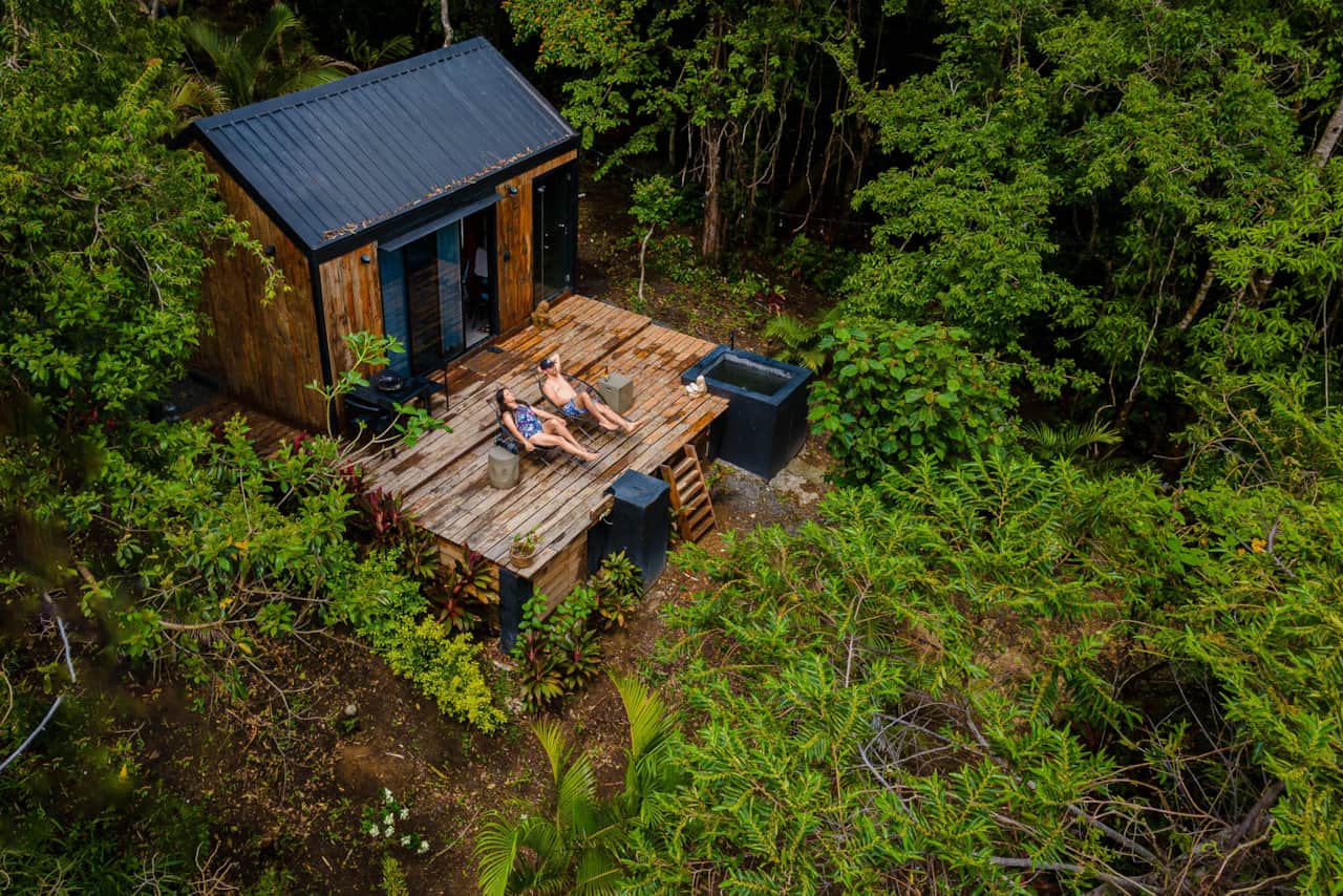Aerial view of our off-grid eco cabin and deck tucked into the Valle de Antón forest, Panama