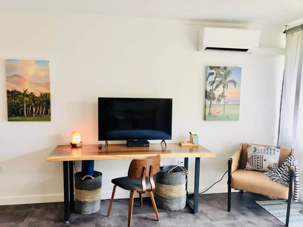 Comfortable work area with a large console desk, fast Wifi, smart TV and cable. TV can be used as a monitor. Yoga mat and brick are stored under the desk.