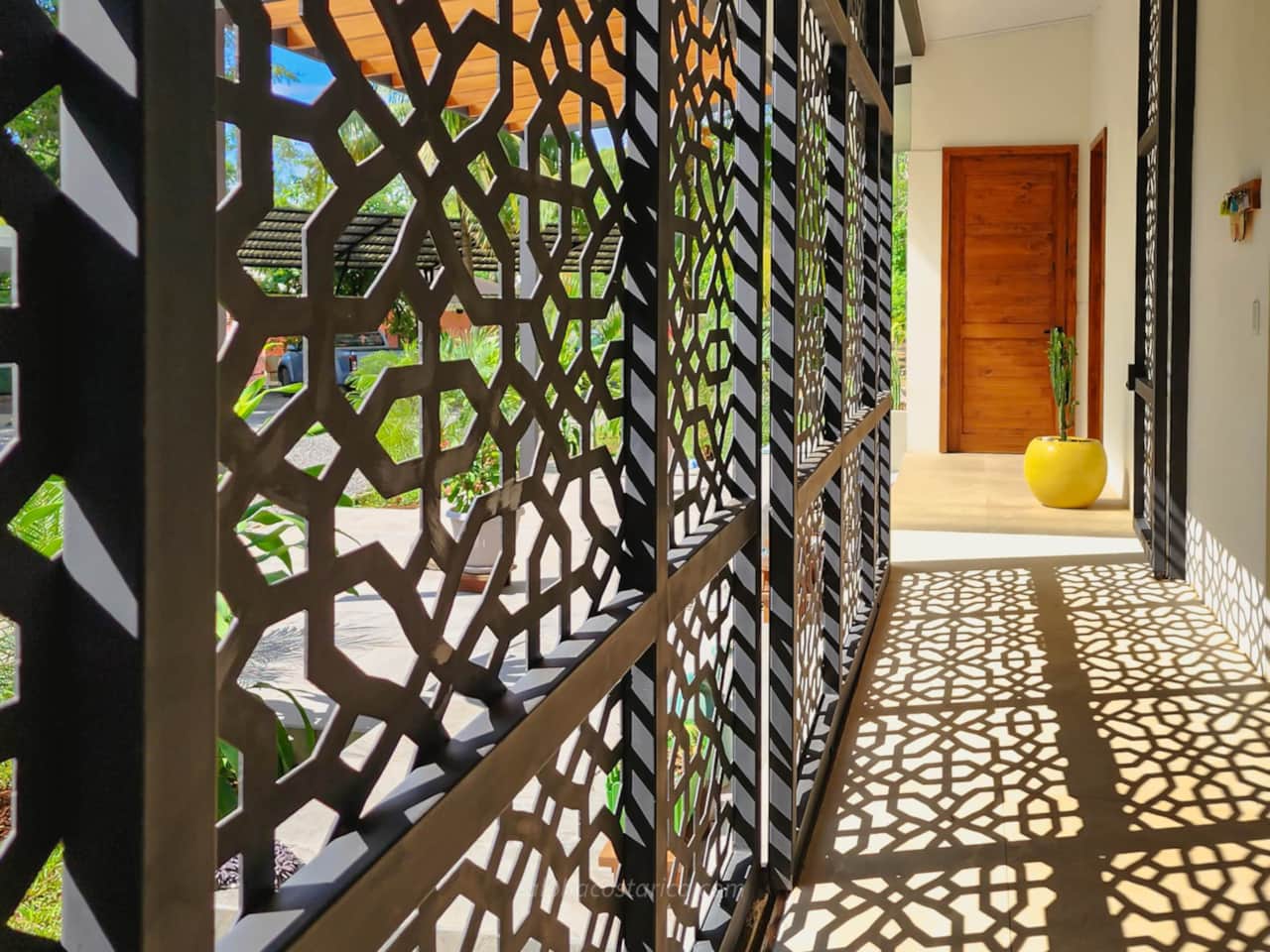 Casa Aloha’s custom metalwork creates ever-changing patterns of light and shadow.