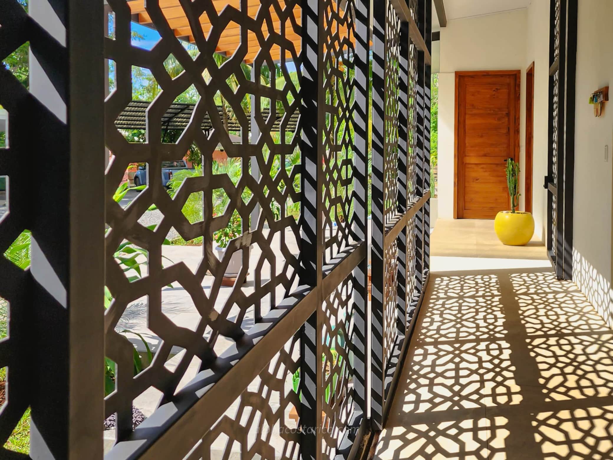 Casa Aloha’s custom metalwork creates ever-changing patterns of light and shadow.