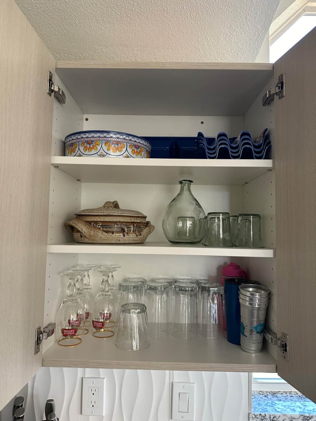 Fully stocked with dishes and serving wear 