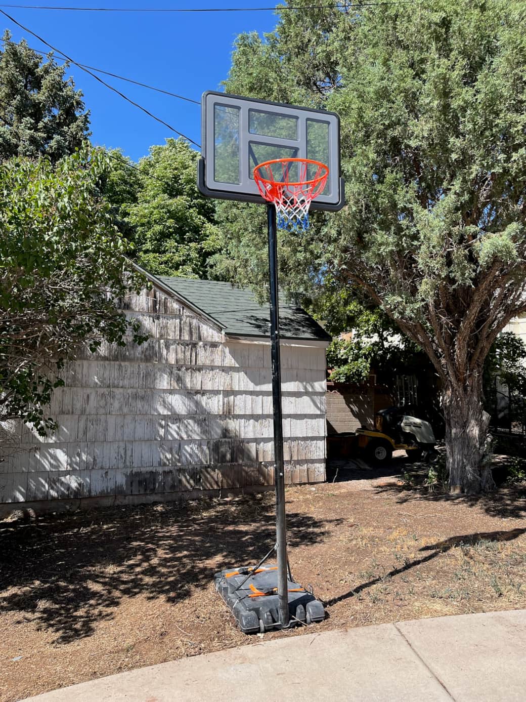 Enjoy a friendly game of basketball right in the driveway—perfect for kids, teens, and family fun