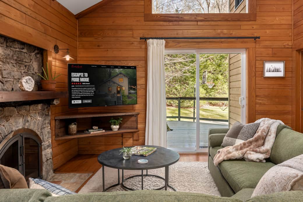 Unwind by the wood stove (not pictured) and enjoy Netflix on the 55" TV.