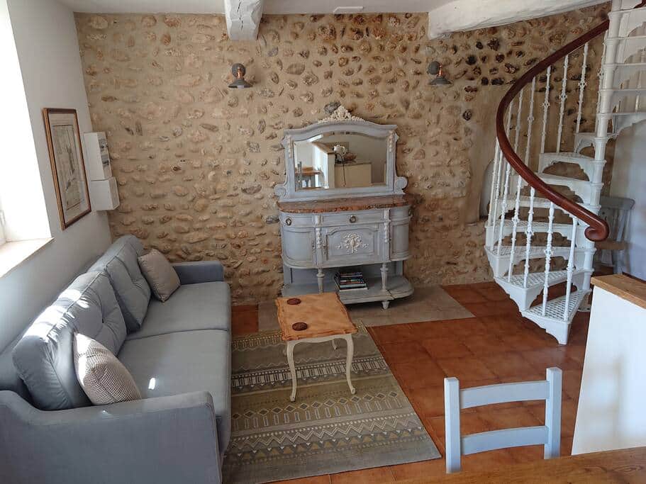 Interior with sofabed and antiques