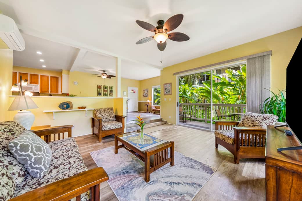 Step into serenity with this inviting living space, where comfort meets nature's beauty.