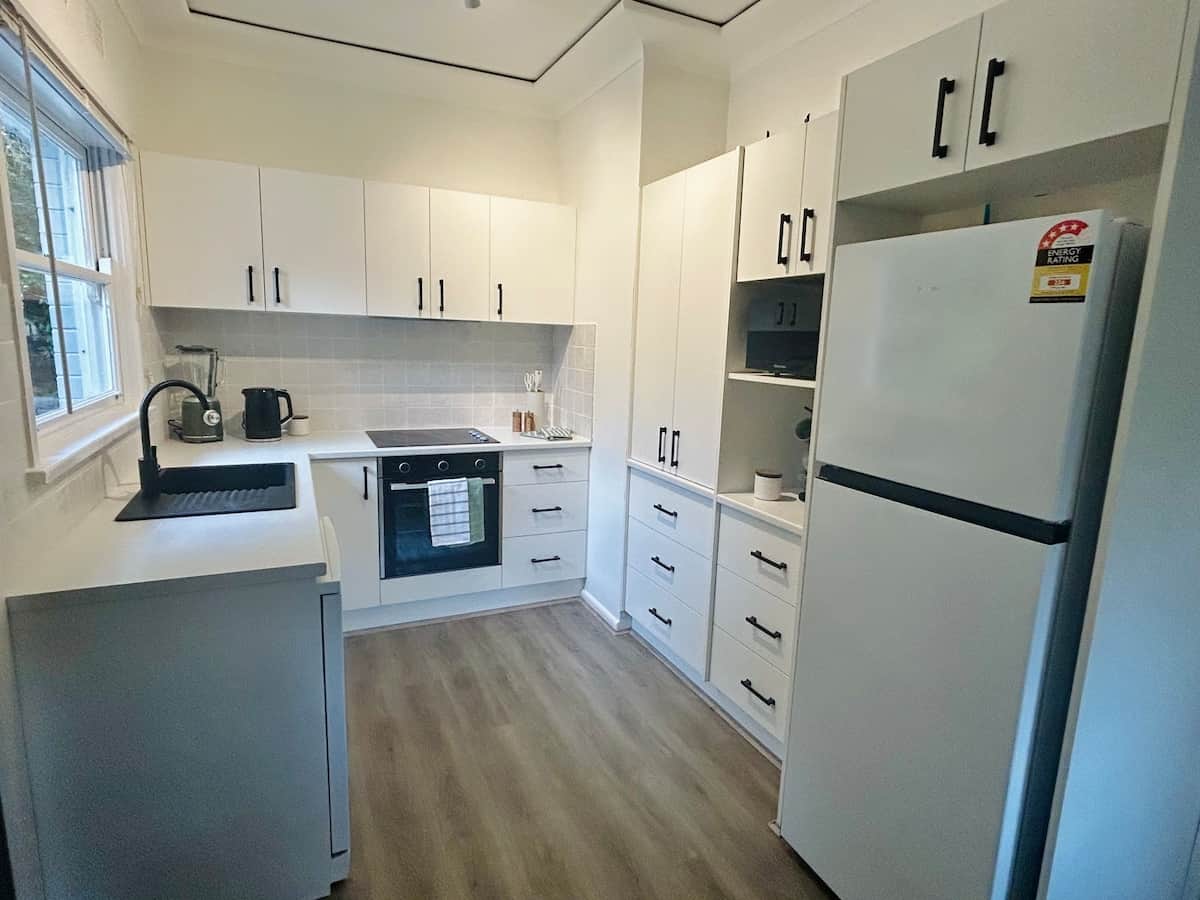 New kitchen with the appliances you need for a home stay.