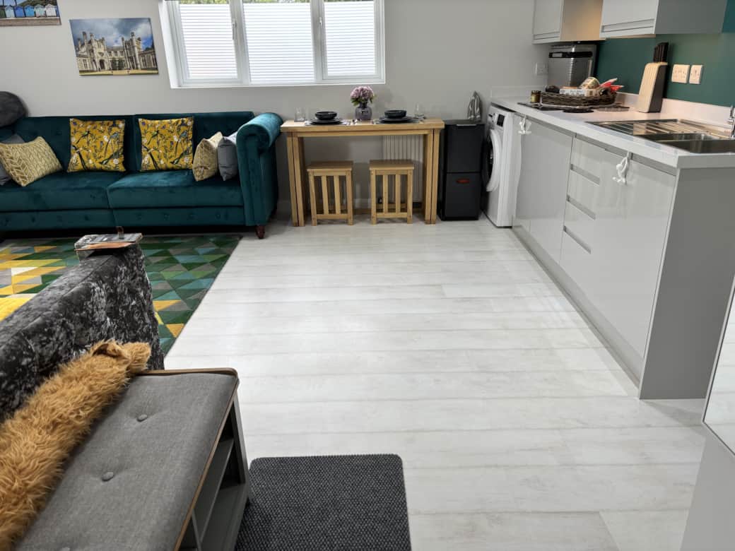 Kitchen with hob, air-fryer, kettle, toaster, fridge and microwave