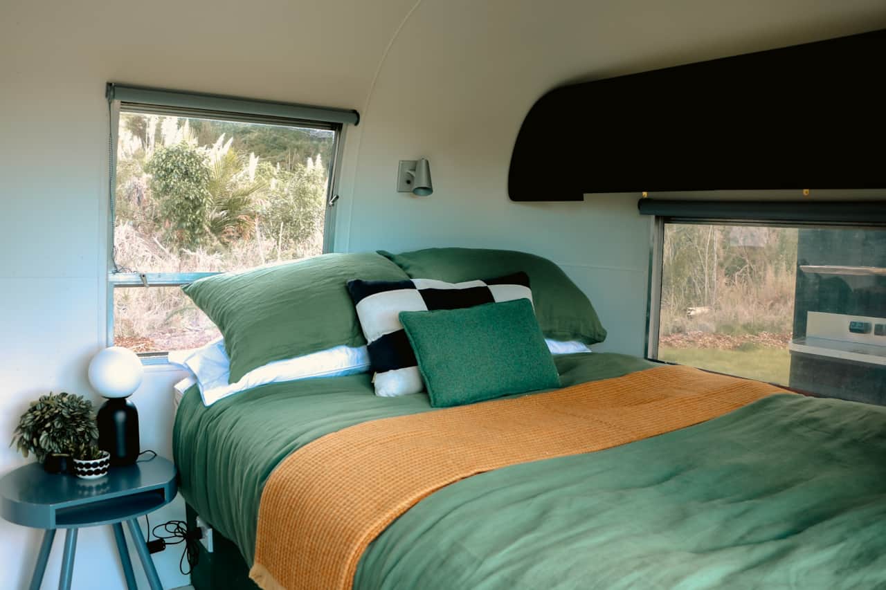 Gorgeous custom made bed with luxury linens