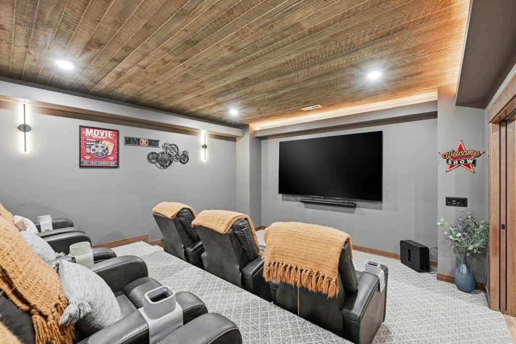 Theater Room 95" TV with 7 Recliner chairs