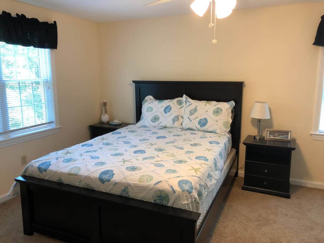 Relax in this bright and airy bedroom with a comfortable queen bed, a peaceful retreat after exploring Cape Cod Relax in this bright and airy bedroom with a comfortable queen bed, a peaceful retreat after exploring Cape Cod